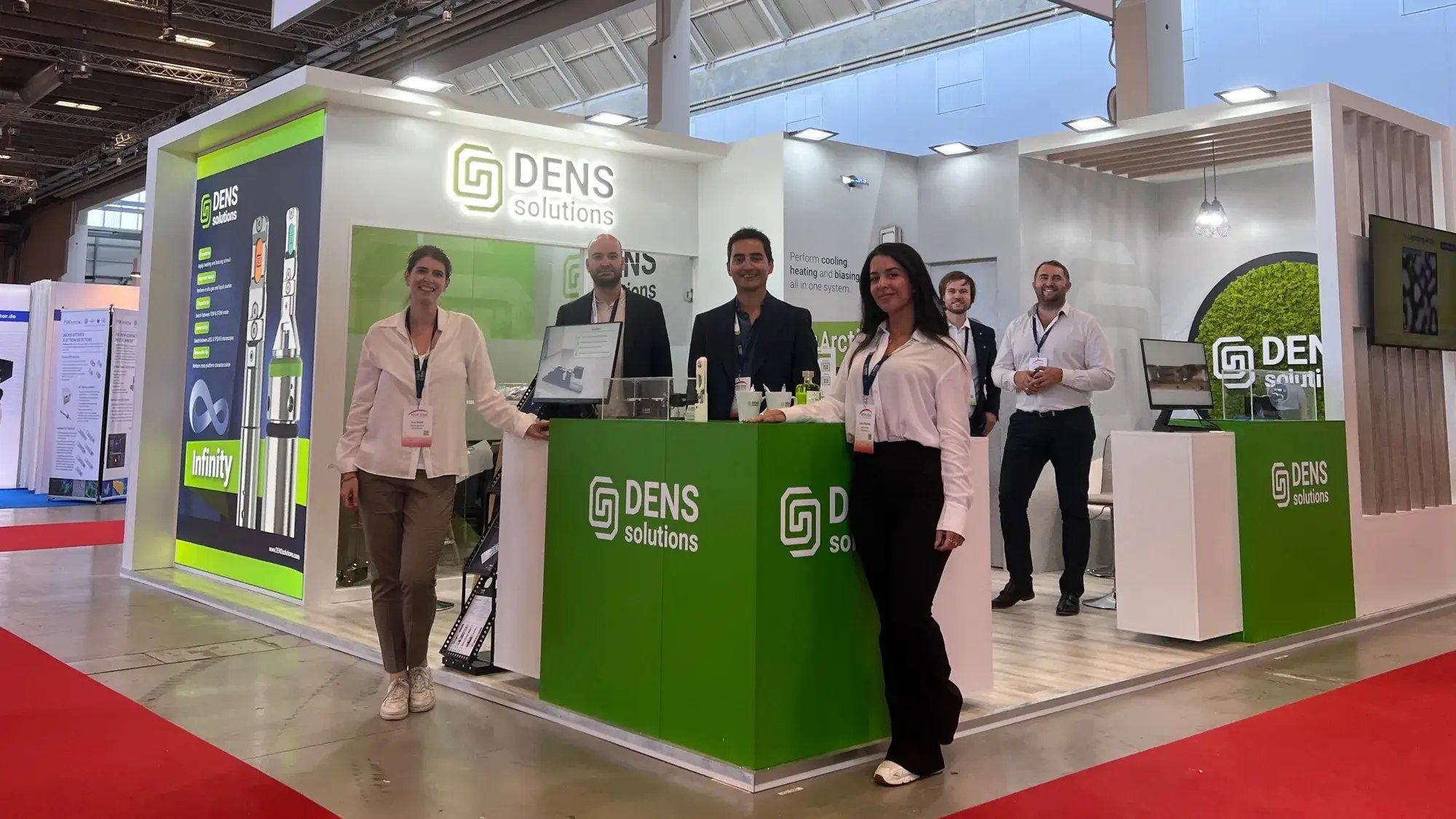 The DENSsolutions stand and team at the EMC 2024 conference
