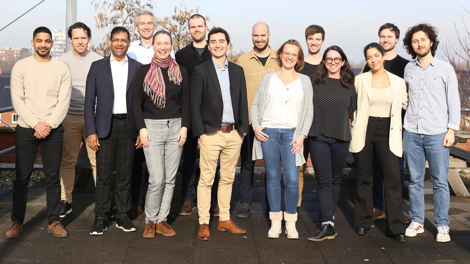 The DENSsolutions team together on the roof terrace at the Delft office